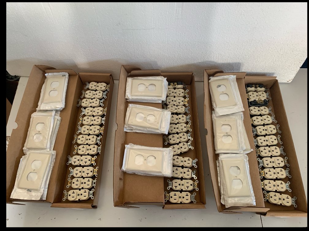 Three Boxes of Almond Duplex Receptacles and Wall Plates