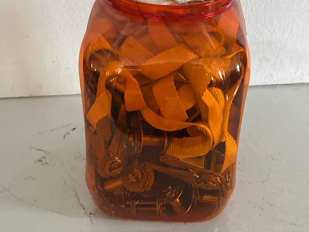 Ratchet Tie-Down Straps in Plastic Storage Container