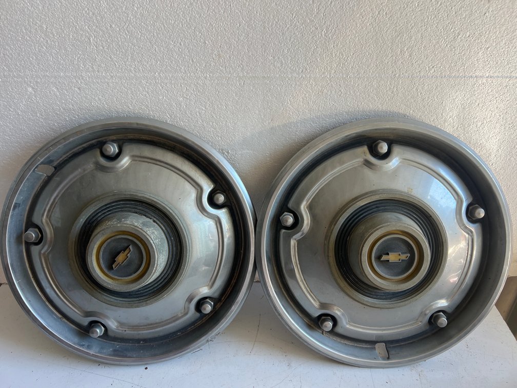Two Chevrolet Hubcaps
