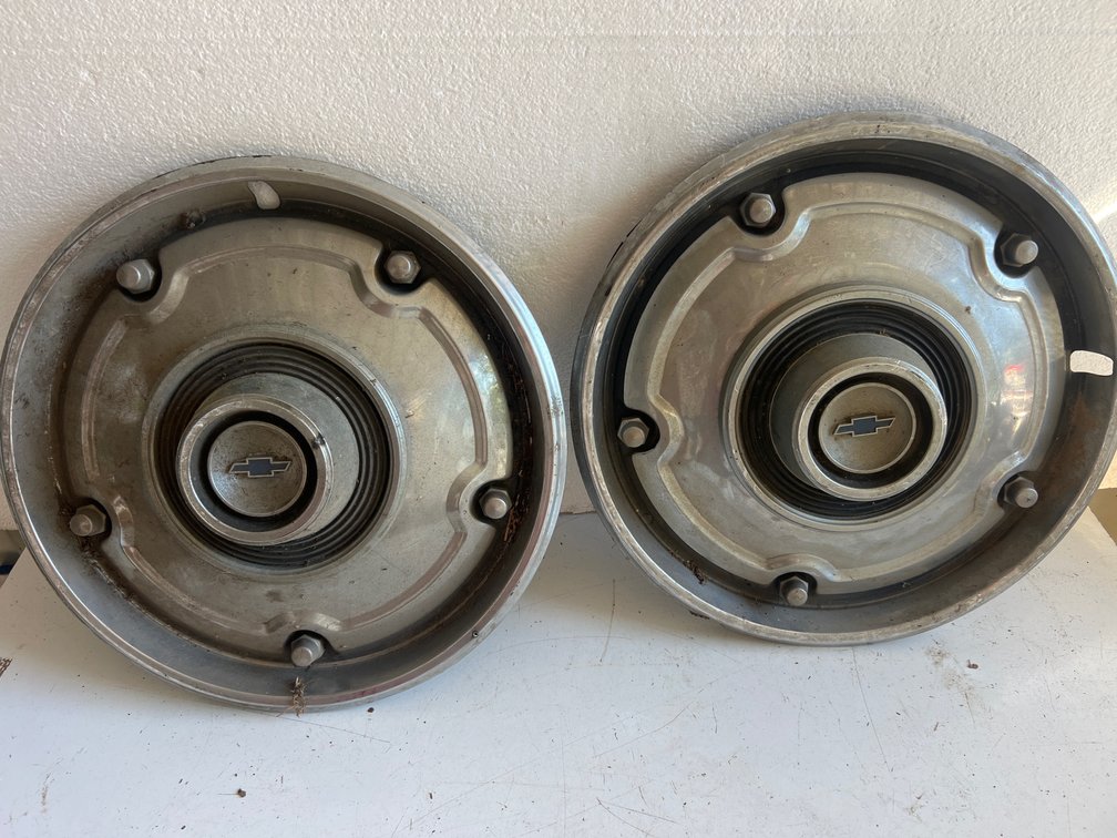 Two Chevrolet Hubcaps