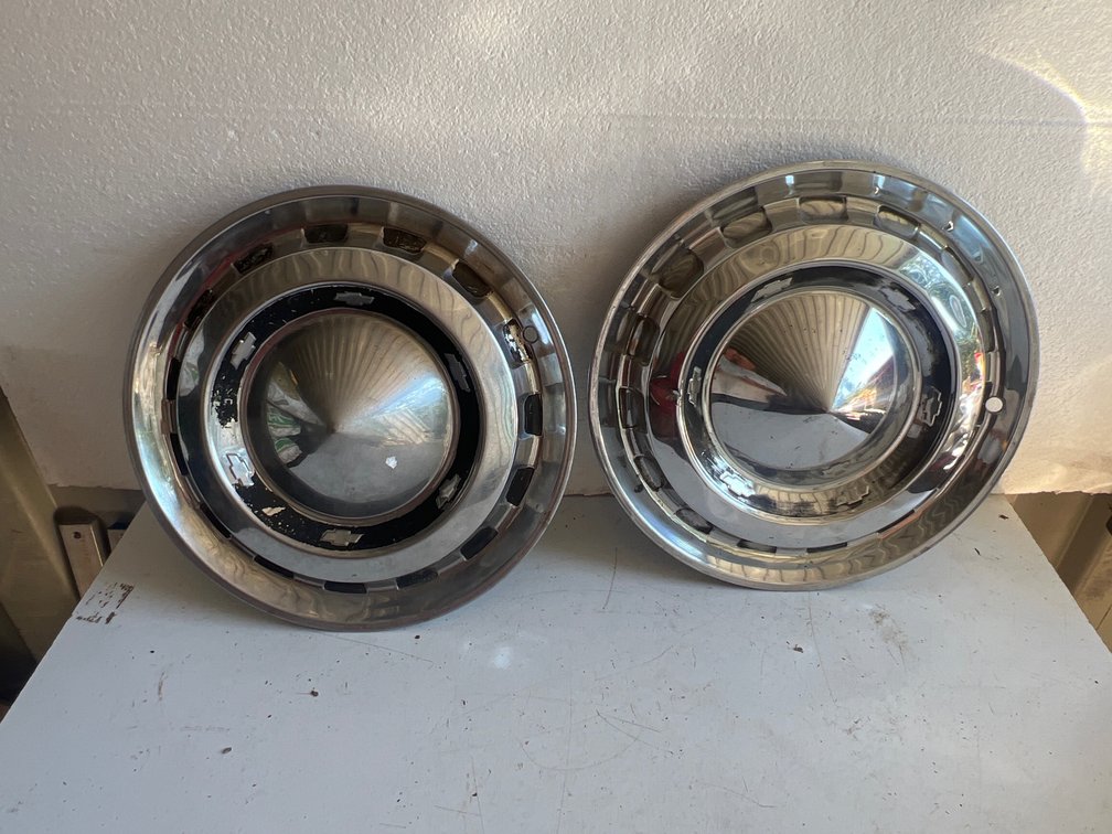 Two Chevrolet Chrome Wheel Covers