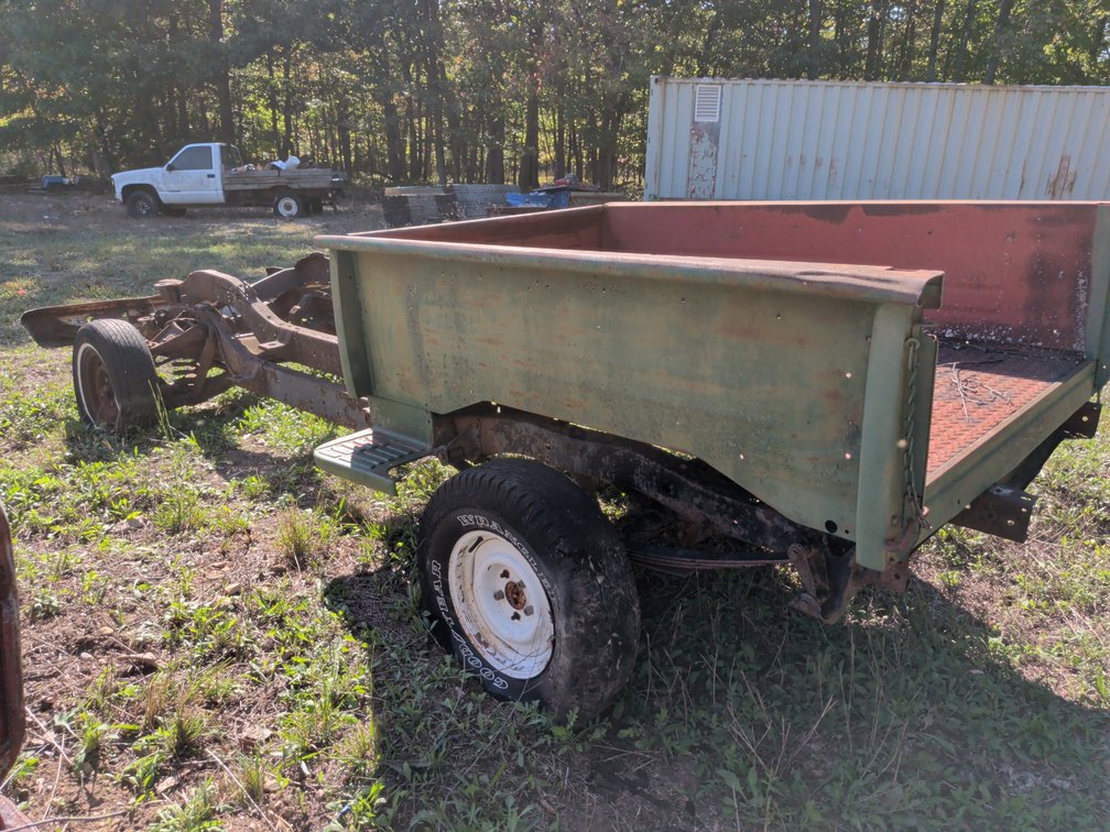 Two Truck Frames and Rolling Truck Chassis with Mounted Pickup Bed