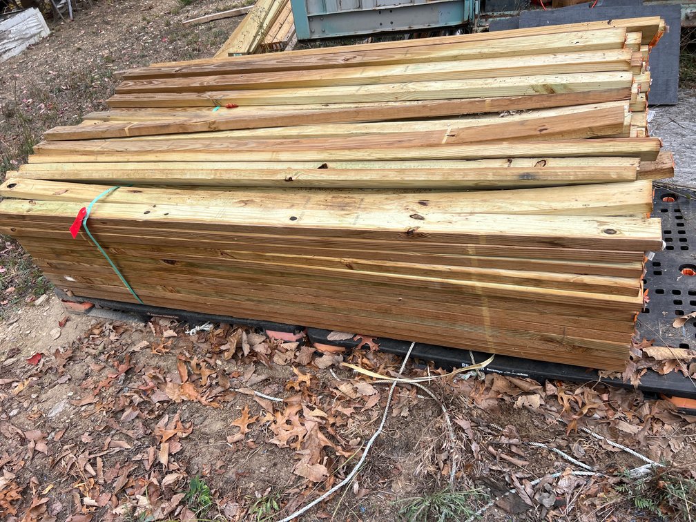 Large Stack Of 2 in x 4 in x 8 ft Treated Lumber
