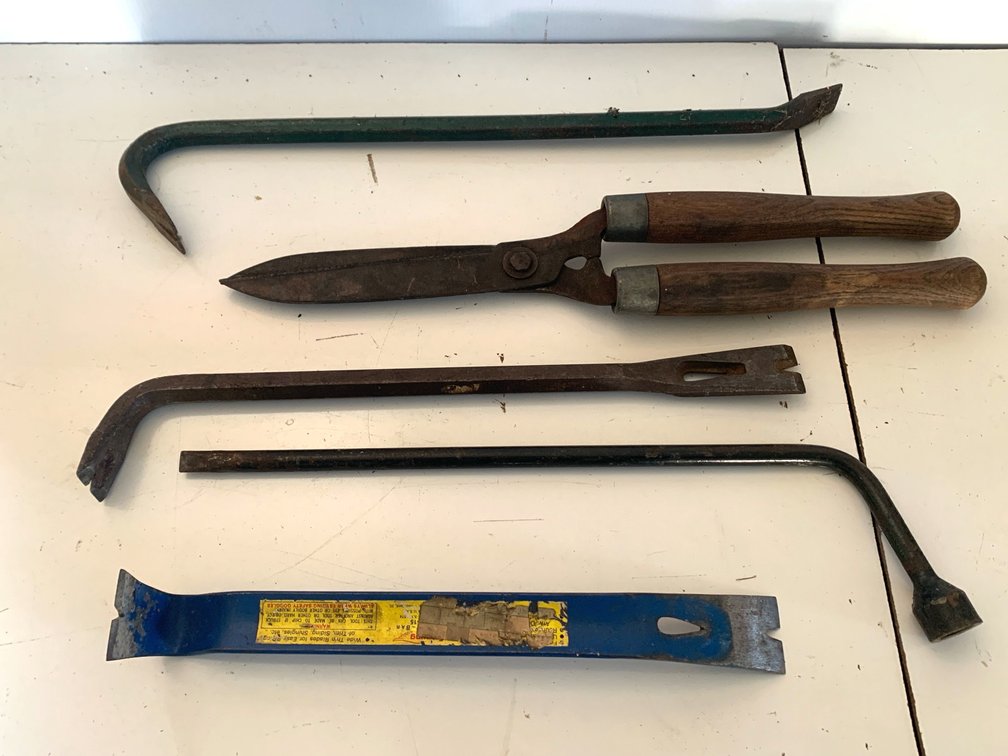 Assorted Utility Pry Bars, Lug Wrench, and Hedge Shears