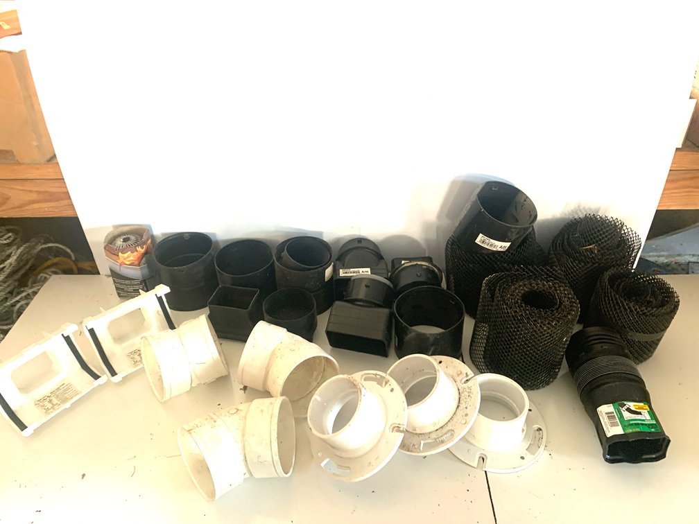 Assorted Drainage, Gutter, and PVC Plumbing Fittings Lot