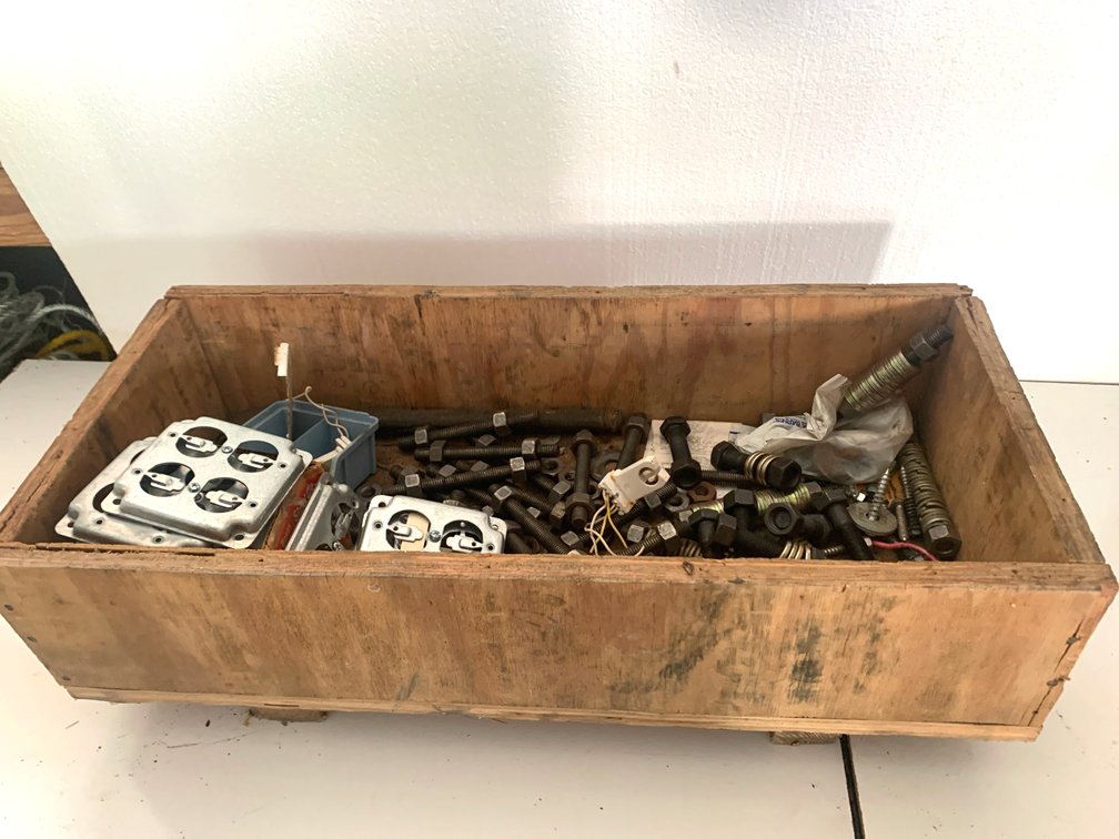 Fasteners, Hardware, and Electrical Components in Wooden Crate