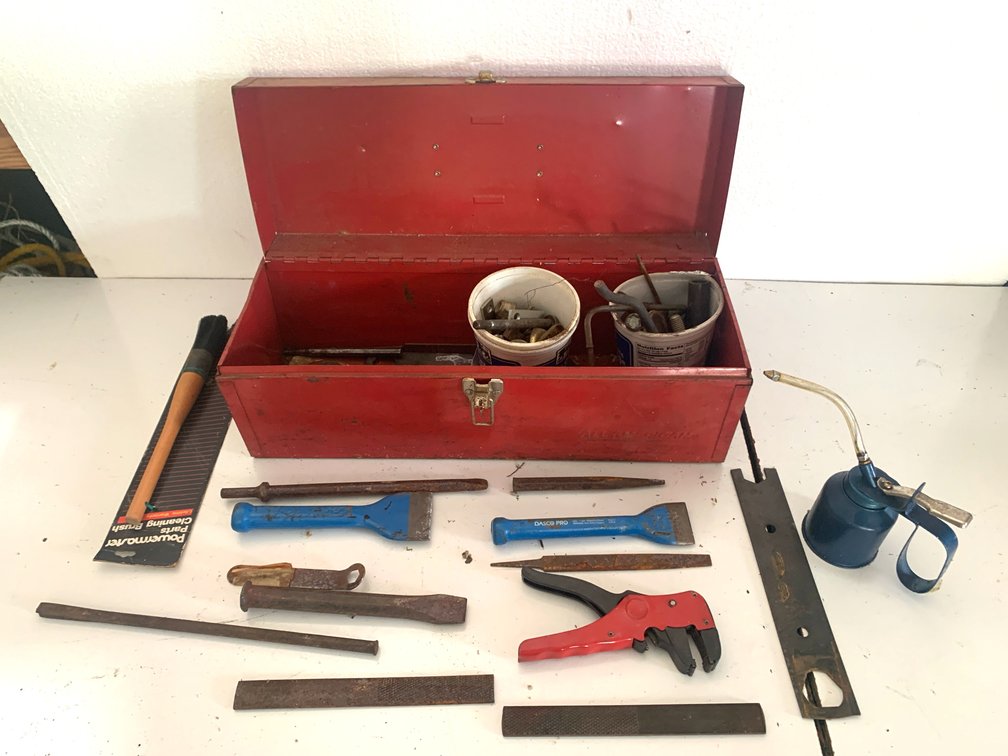 Red Metal Toolbox with Hand Tools and Hardware