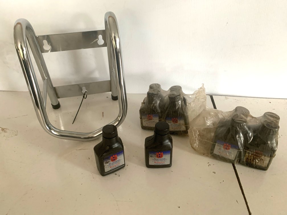 Tubular Metal Wall Rack and 2-Stroke Engine Oil