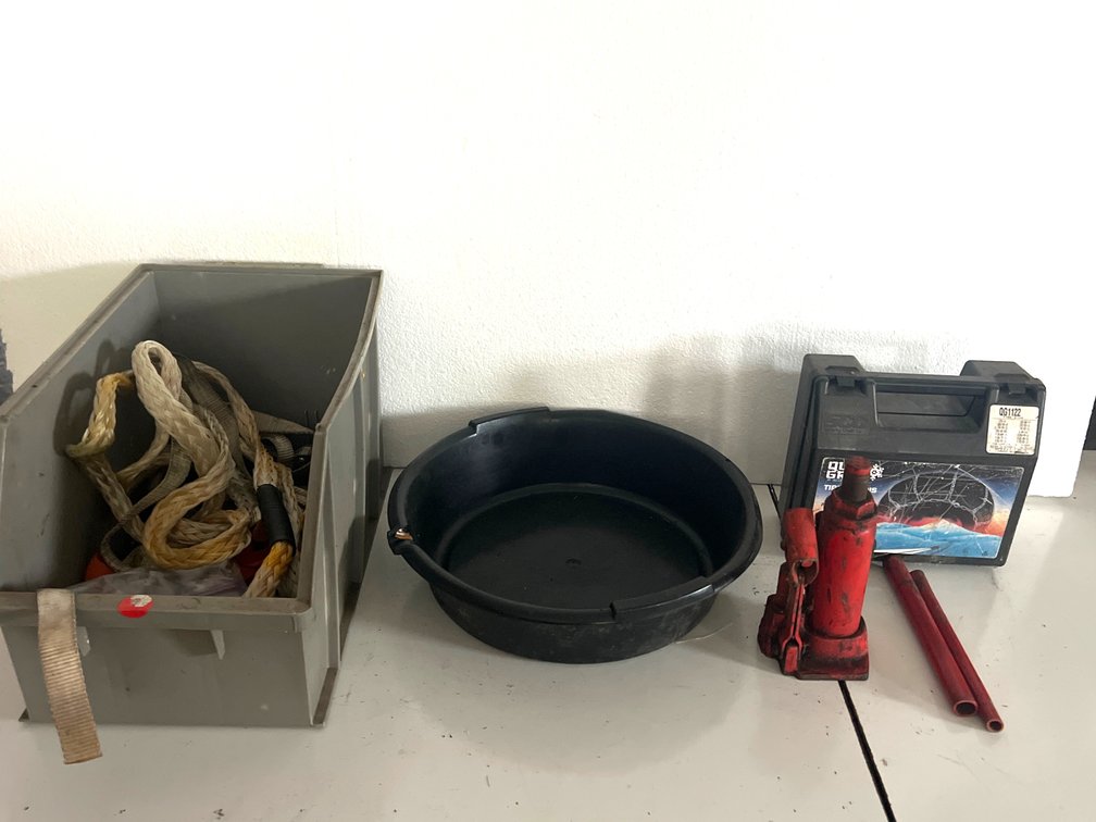 Hydraulic Bottle Jack, Tire Chains Case, Tow Straps, and More