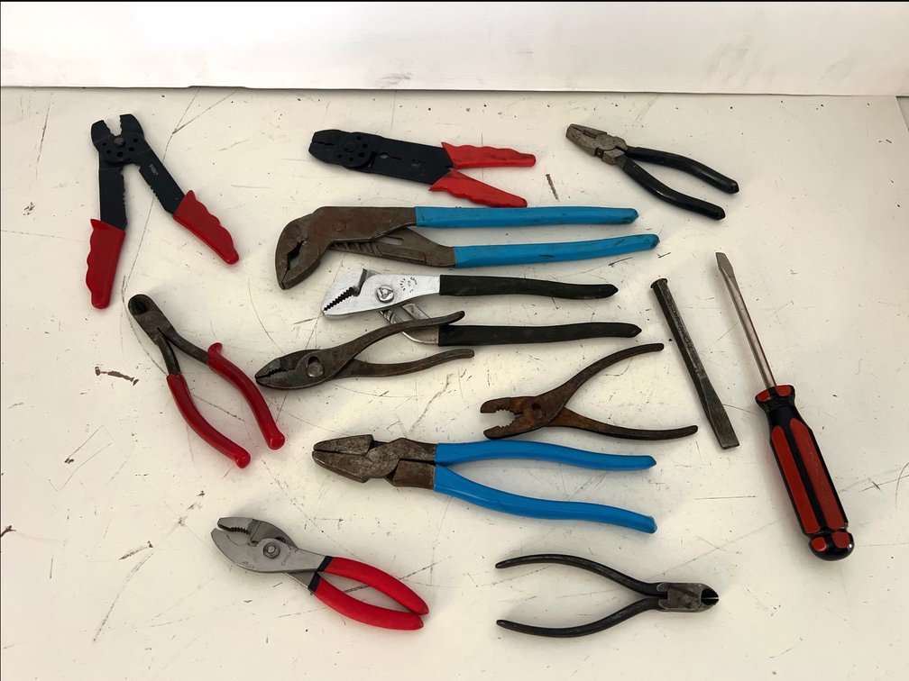 Pliers, Wire Strippers, Chisel, and Screwdriver