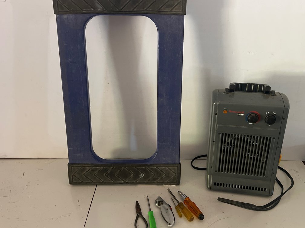 Electric Space Heater, Plastic Dolly, and Hand Tools