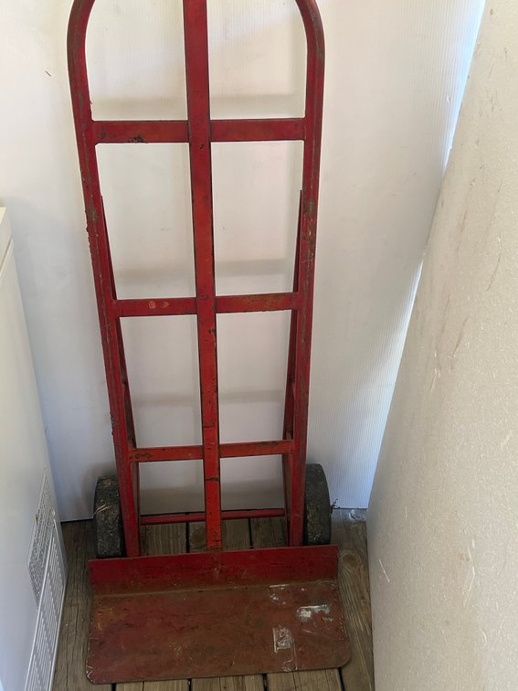 Red Steel Hand Truck with Loop Handle and Solid Wheels