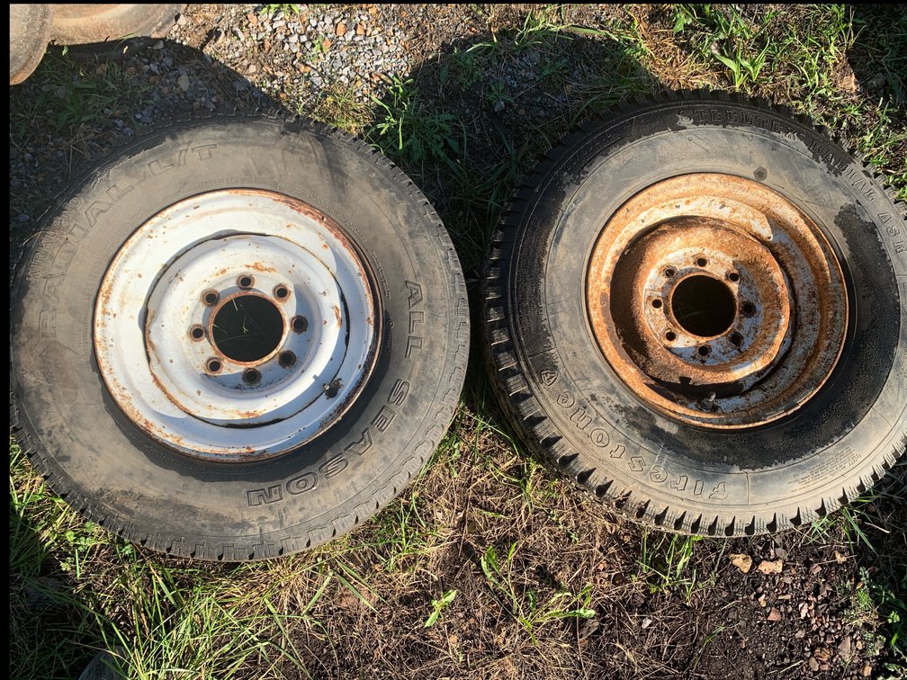 Two Mounted Tires on 8-Lug Steel Wheels