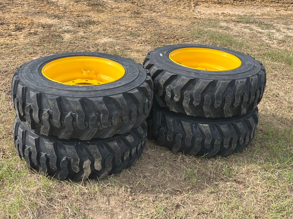 (4) Forerunner SKS-1 10-16.5 Skid Steer Tires on Wheels