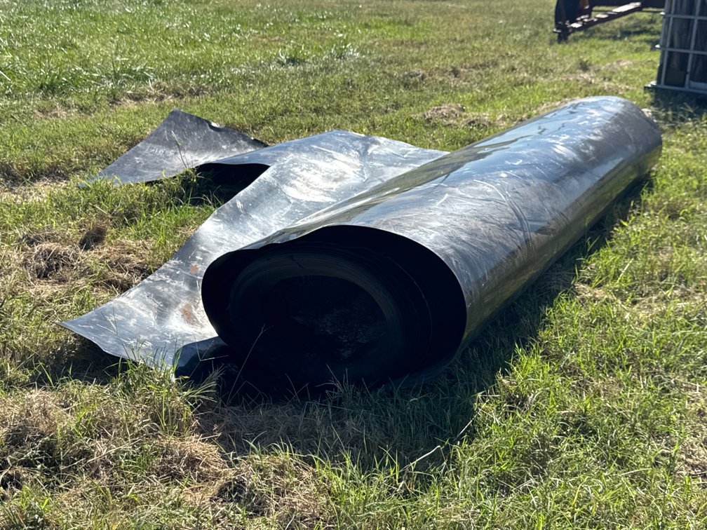 Roll of Heavy-Duty Black Plastic Liner Sheeting