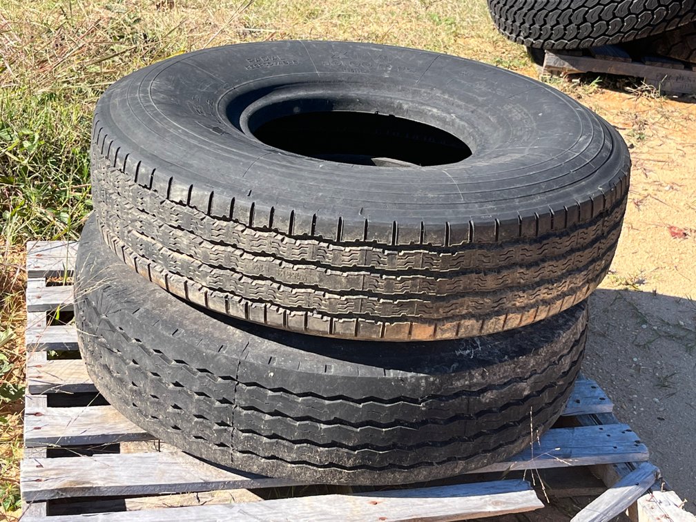Two 10.00 R 15 Radial Truck Tires