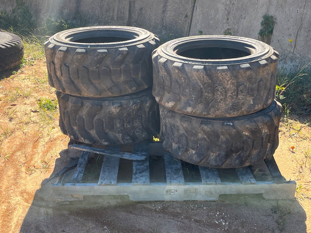Four XTRA-WALL 10-16.5 Heavy-Duty Skid Loader Tires