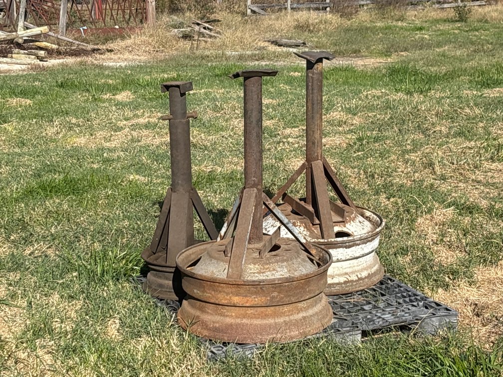Three Fabricated Steel Jack Stands on Wheels