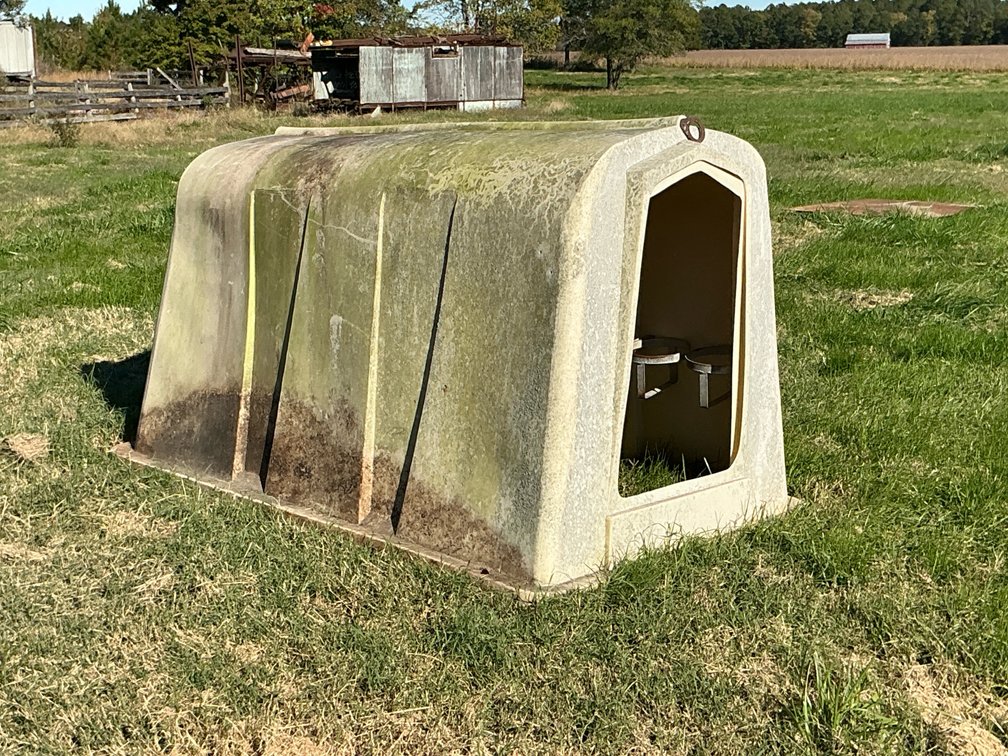 Two Molded Polyethylene Calf Hutches with End Vents