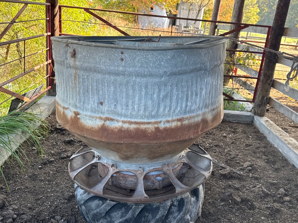 Pride of the Farm Galvanized Hog Feeder on Tire Base