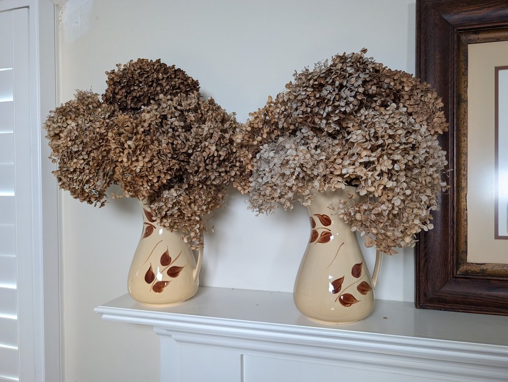 Two Watt Pottery Pitchers With Dried Flowers