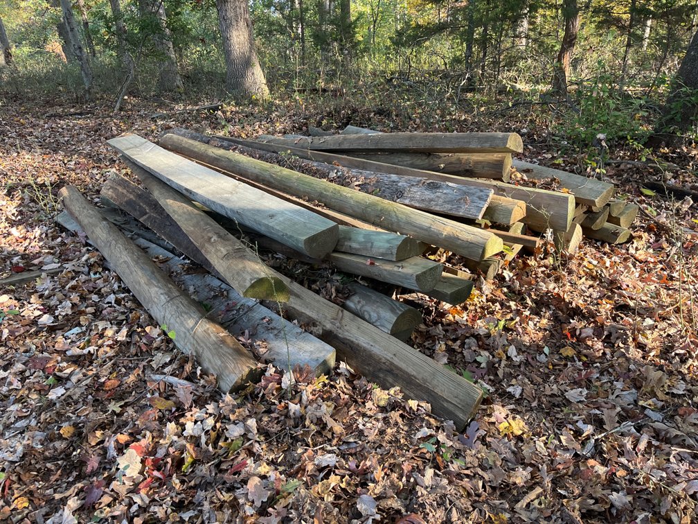(45) 8’ Treated Half Round Posts