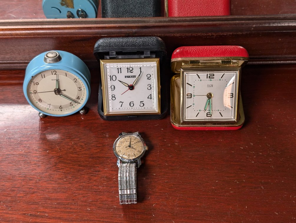 Three Alarm Clocks and Mens Watch