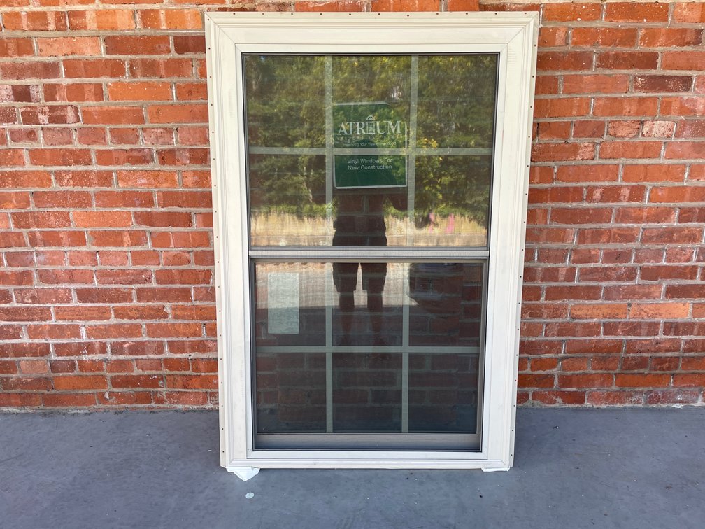Atrium tan vinyl window