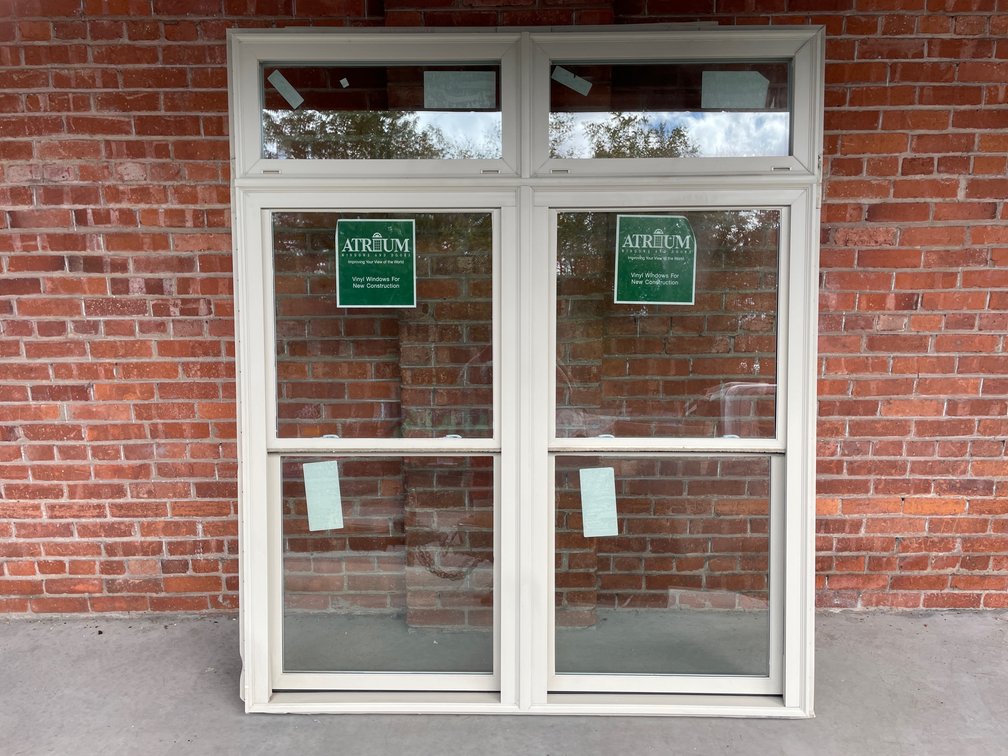 Atrium vinyl tan double window