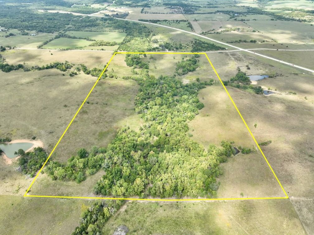 80+- Acres Northwest of Fredonia in Wilson County, Kansas – Heavy Timber, Spring Water, Pasture, & Great Hunting photo 2