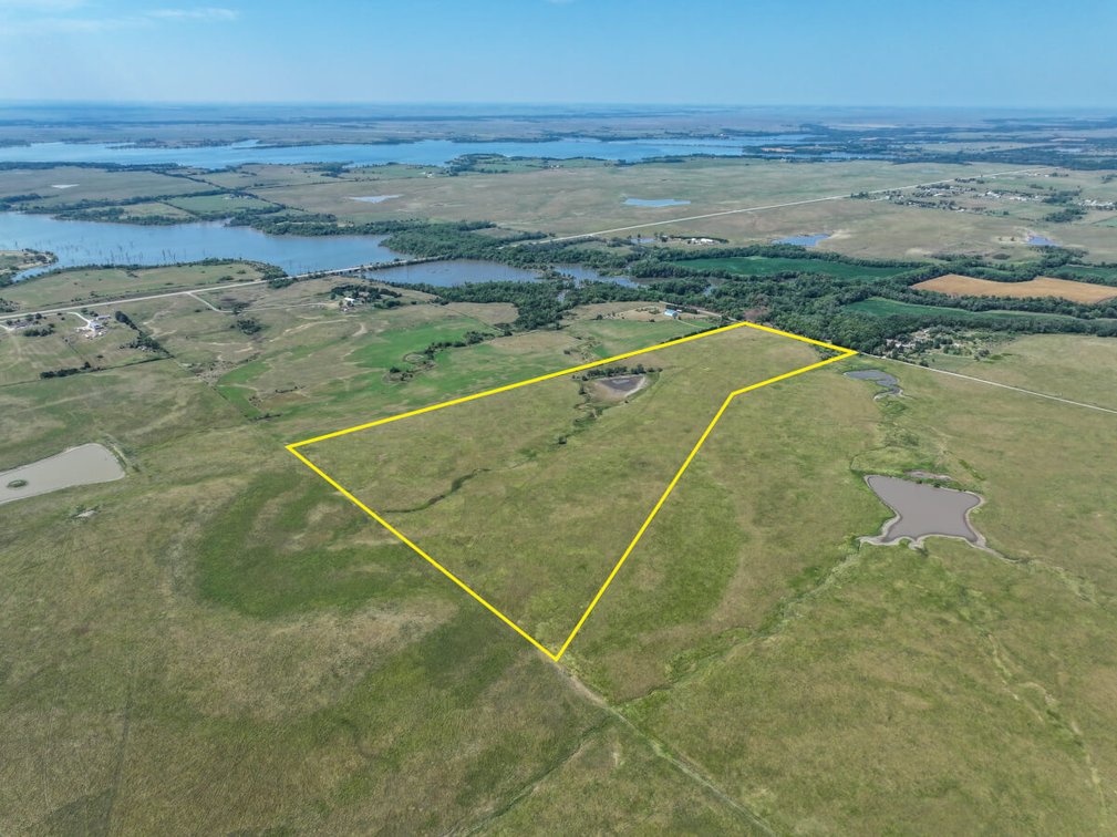 53.5 Acres of Native Pasture and a Large Pond near El Dorado Lake photo 3