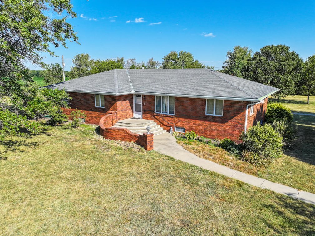15592 NW 60th, Whitewater, Kansas – Brick home on 9.6+/- acres photo 1
