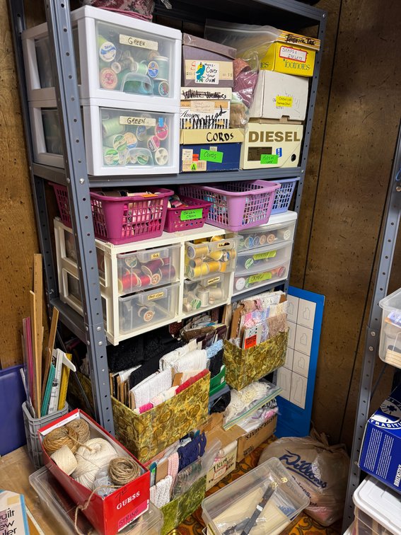 Contents of North basement wall, sewing, fabric, material, misc. craft materials, vintage treadle sewing machine stand- no top photo 3