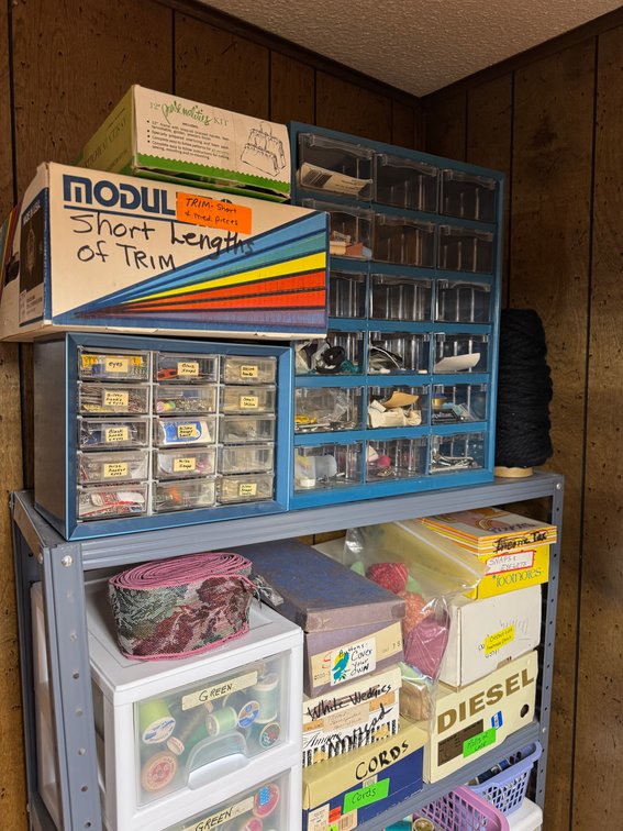 Contents of North basement wall, sewing, fabric, material, misc. craft materials, vintage treadle sewing machine stand- no top photo 4