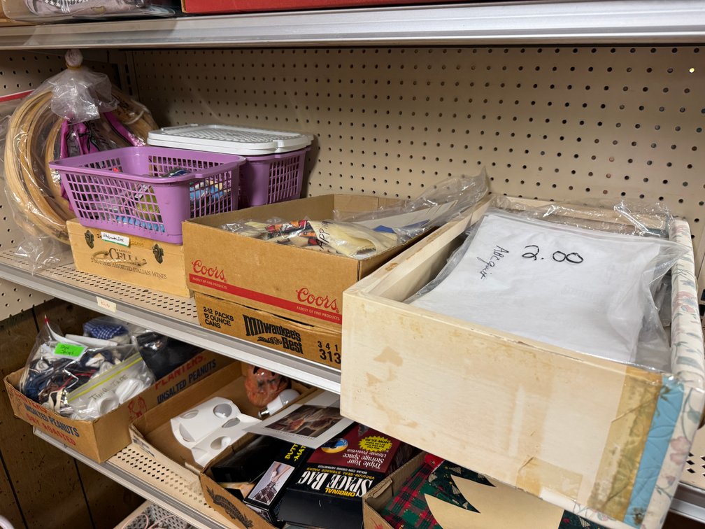Contents of North basement wall, sewing, fabric, material, misc. craft materials, vintage treadle sewing machine stand- no top photo 12