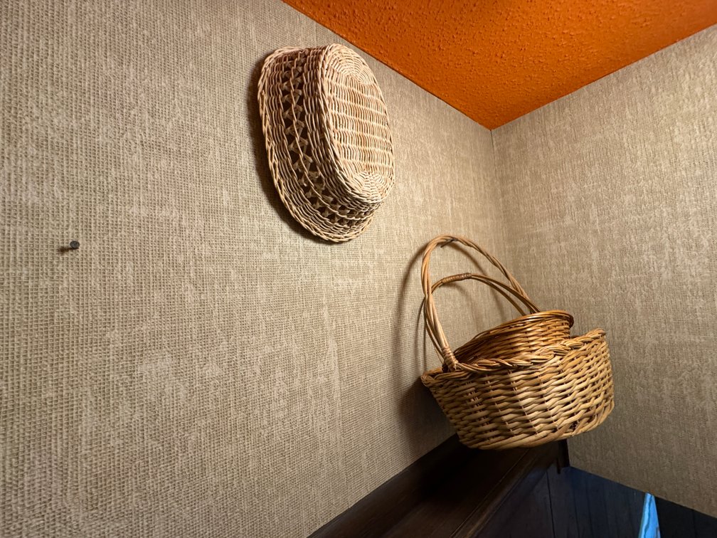 Whicker baskets in stairwell photo 4