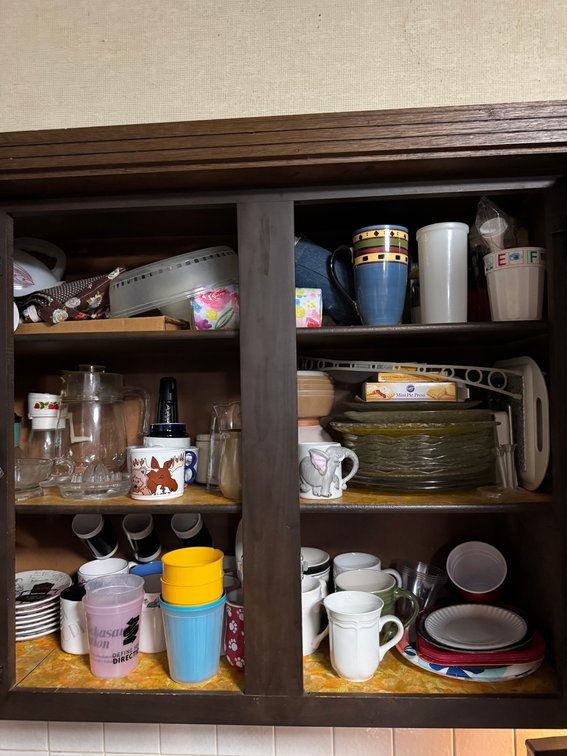 Cups, contents of cabinet