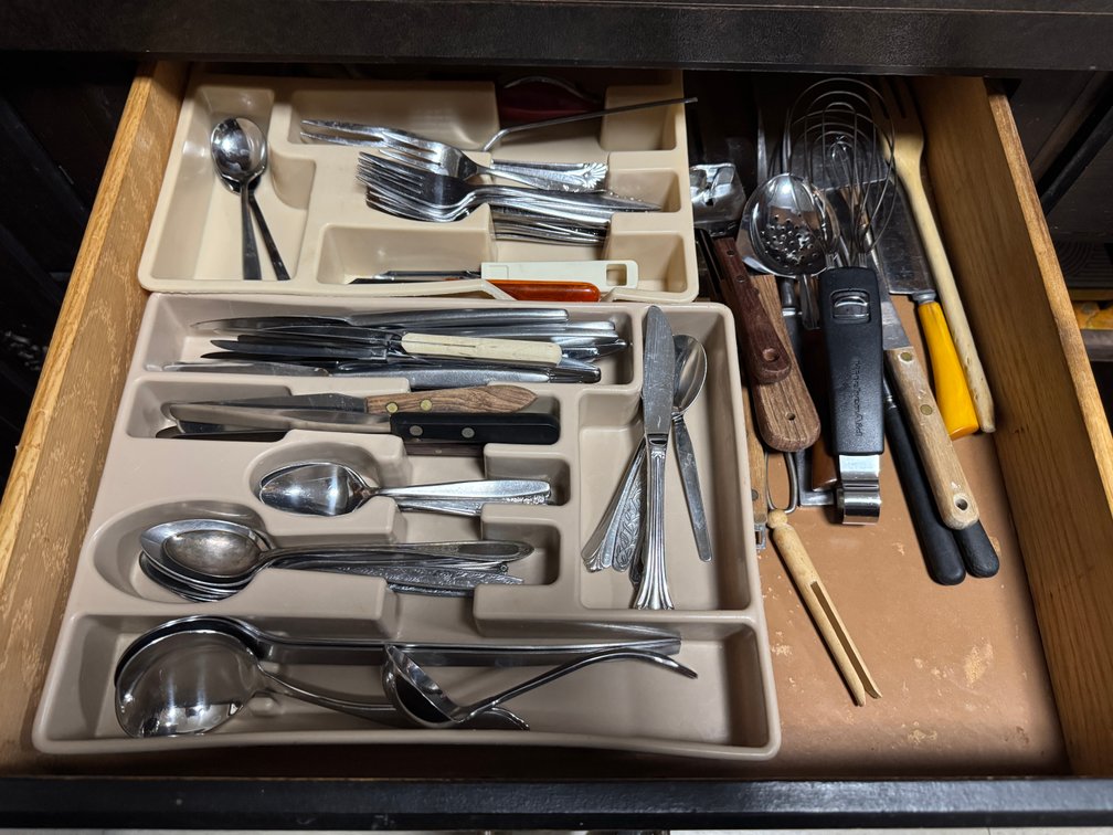 Contents of lower cabinet, pots and pans