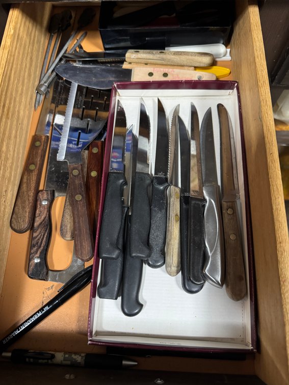 Contents of lower cabinet and drawers photo 6