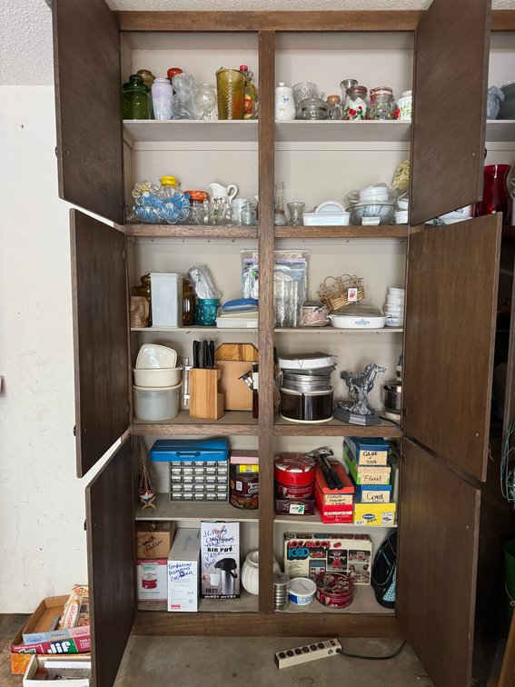 Contents of Garage Cabinet, glassware, knives, décor, tools