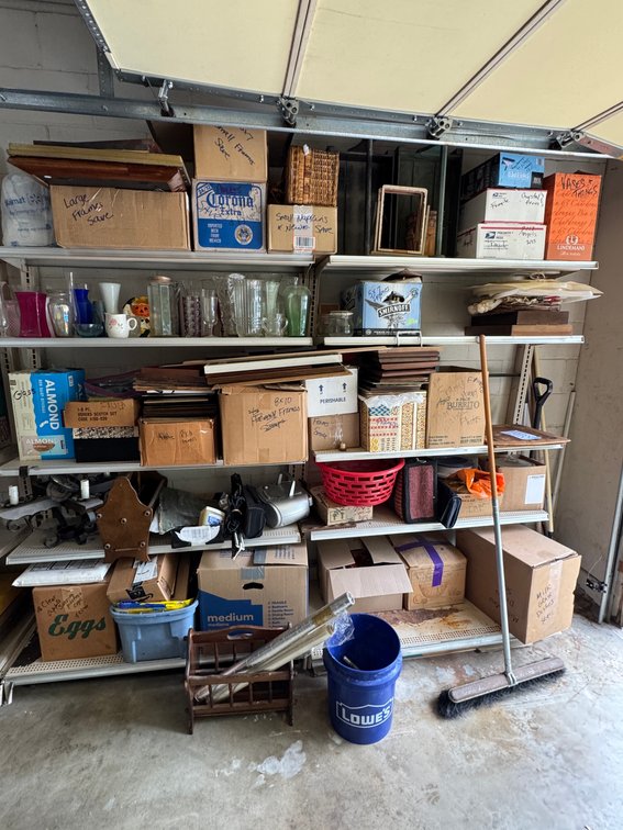 Contents of southwest garage shelves, Vases, frames, décor, yard tools, etc.