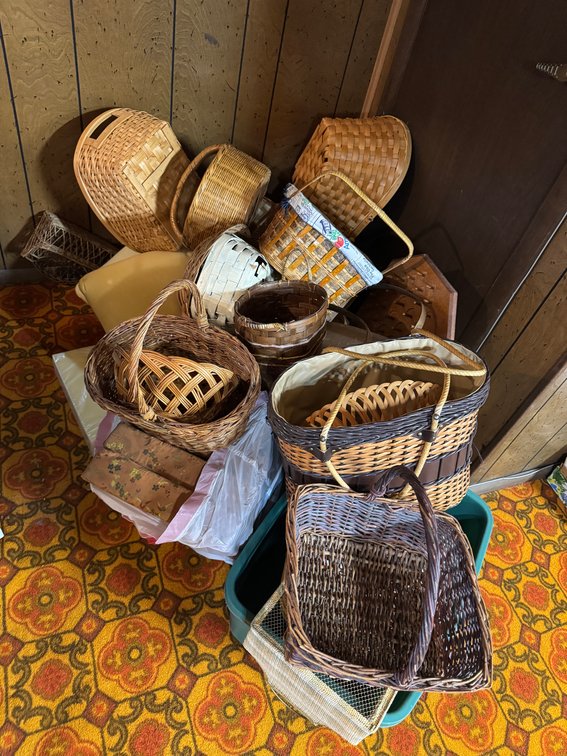 Large lot of assorted whicker baskets