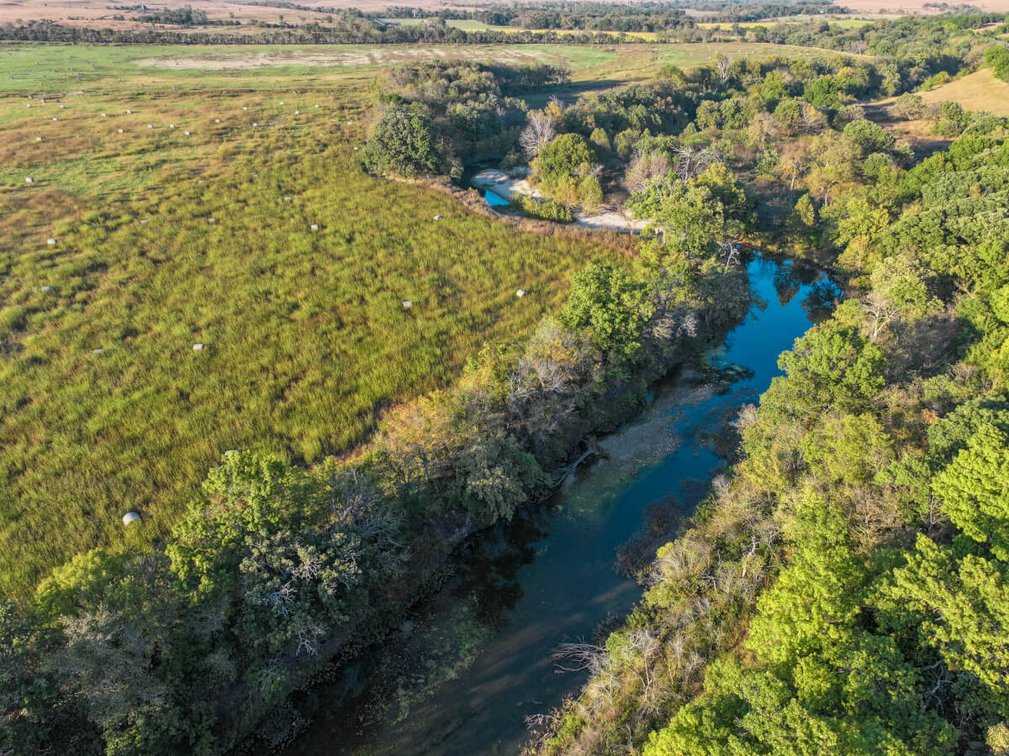 128.8 Acres Cowley County, KS – Grouse Creek, Cattle Pens, Brome Grass, Trees & Hunting/Fishing! photo 2