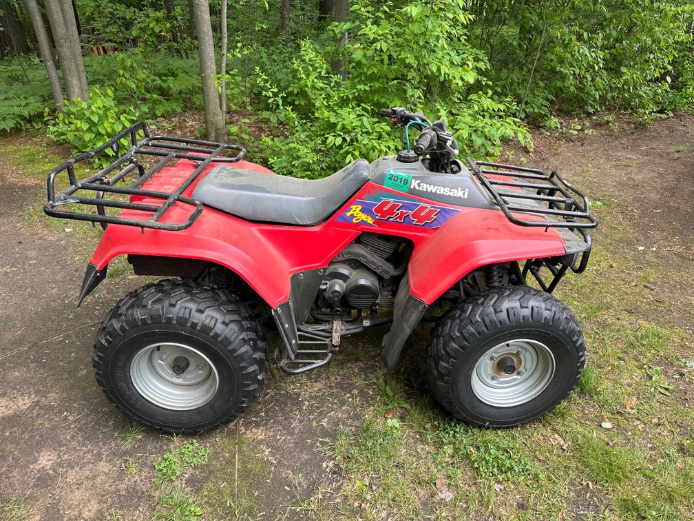 Kawasaki 4 Wheeler with Plow Blade