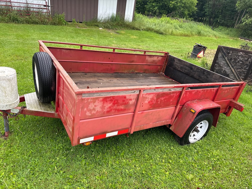 Red Trailer, Has Flat Tire