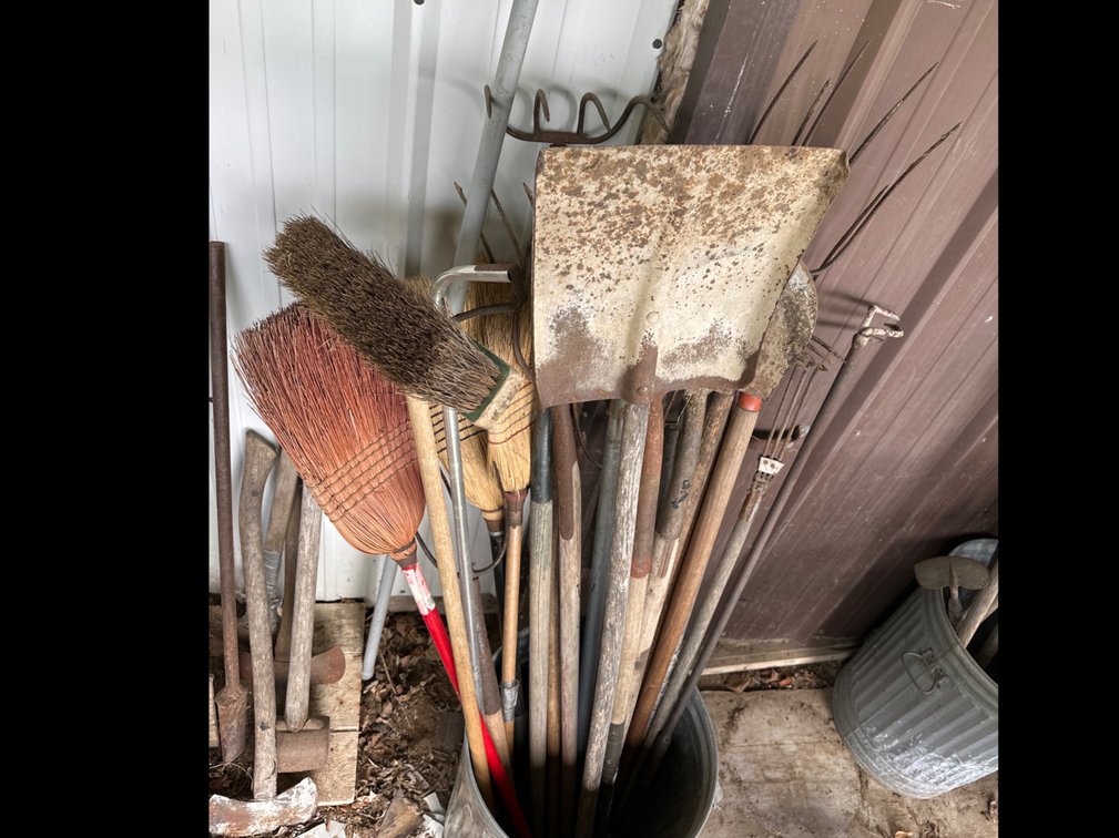 Garbage Can with Brooms, Shovels