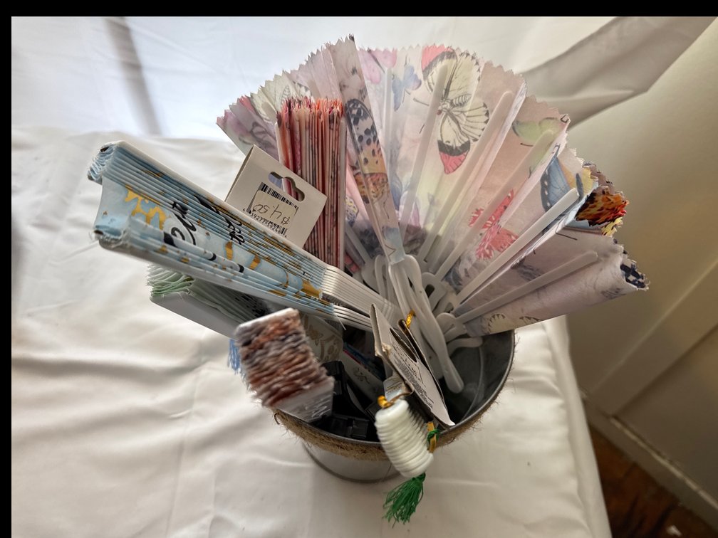 Bucket of Assorted Foldable Fans