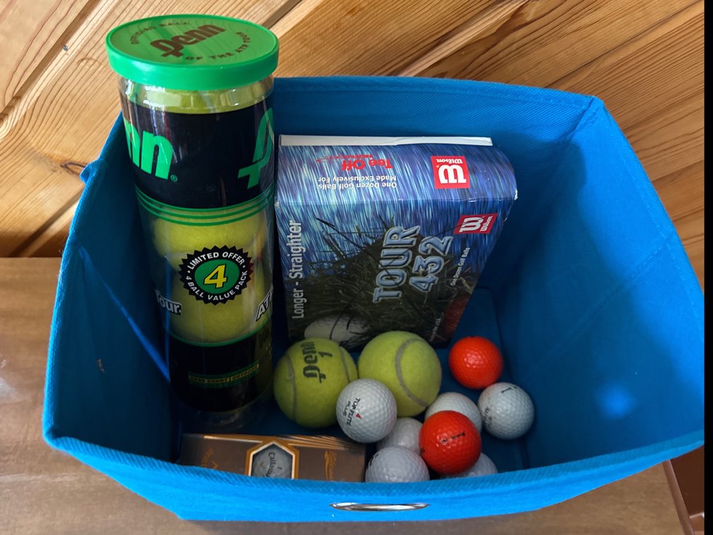 Tote of Assorted Golf Balls, Tennis Balls, Golf Tees