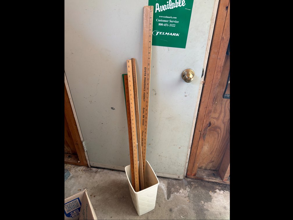 Bucket Full of Yard Sticks