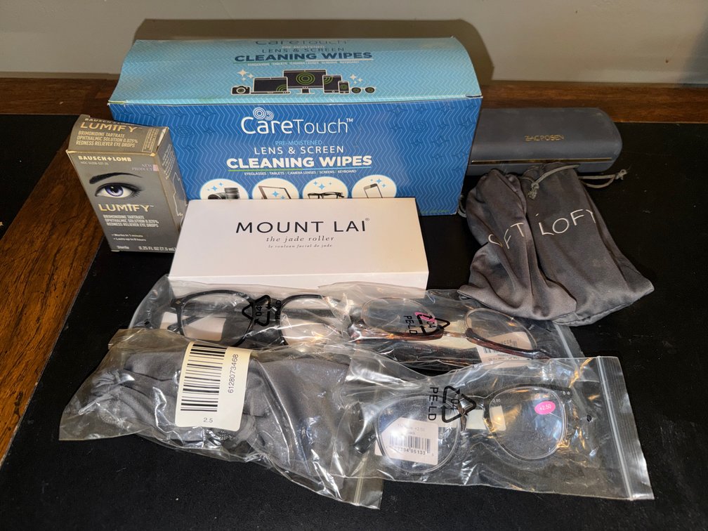 Lot of Eyeglasses and Eye Glass Cleaning Supplies